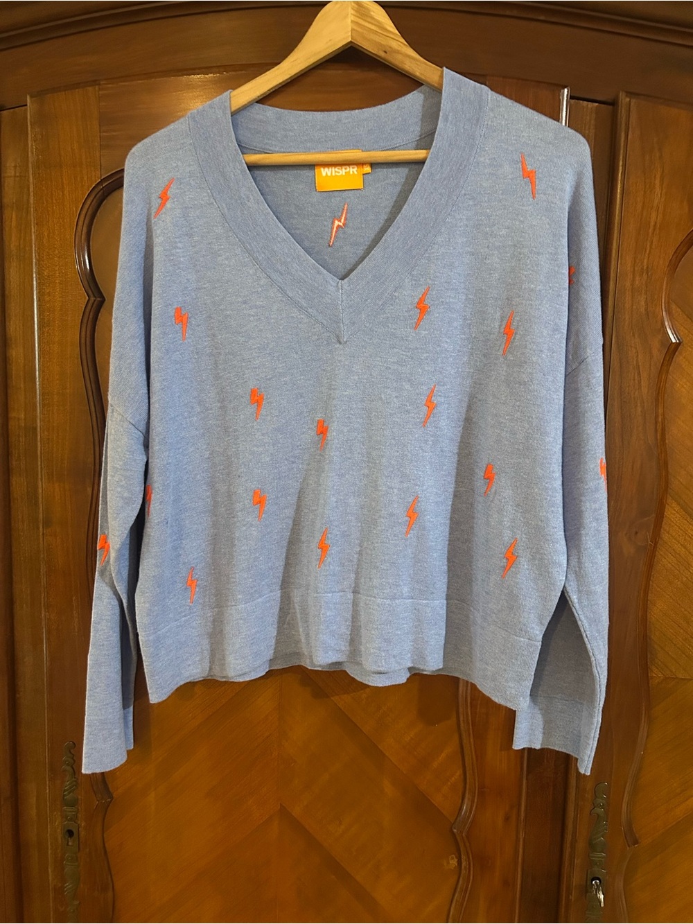 WISPR Light Blue V-Neck Sweater with Orange Bolt Accent size XS #1162